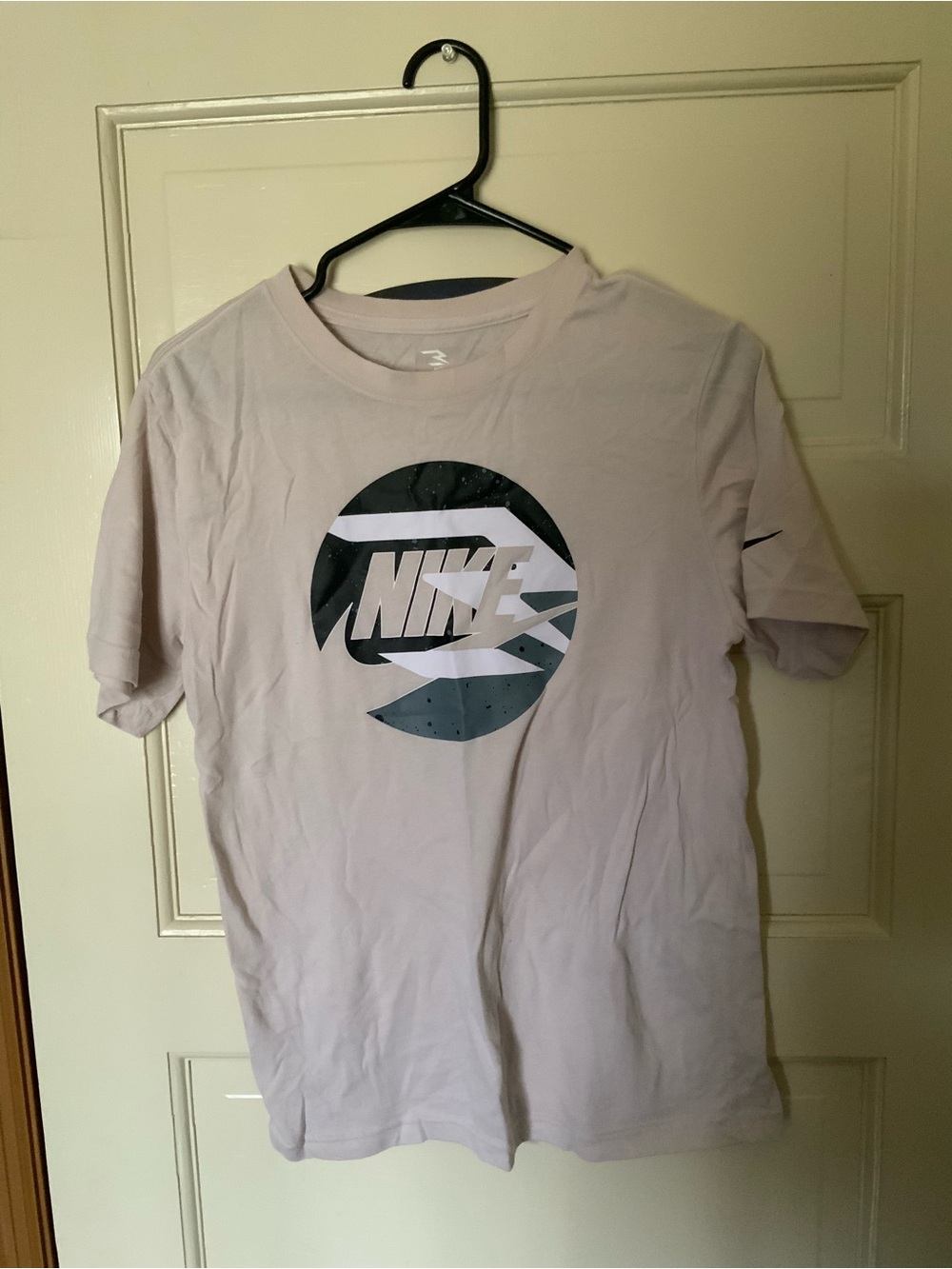 Nike Short Sleeve Crewneck T-Shirt in Pale Pink with Black Logo